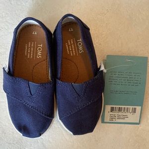 Toms, with tags